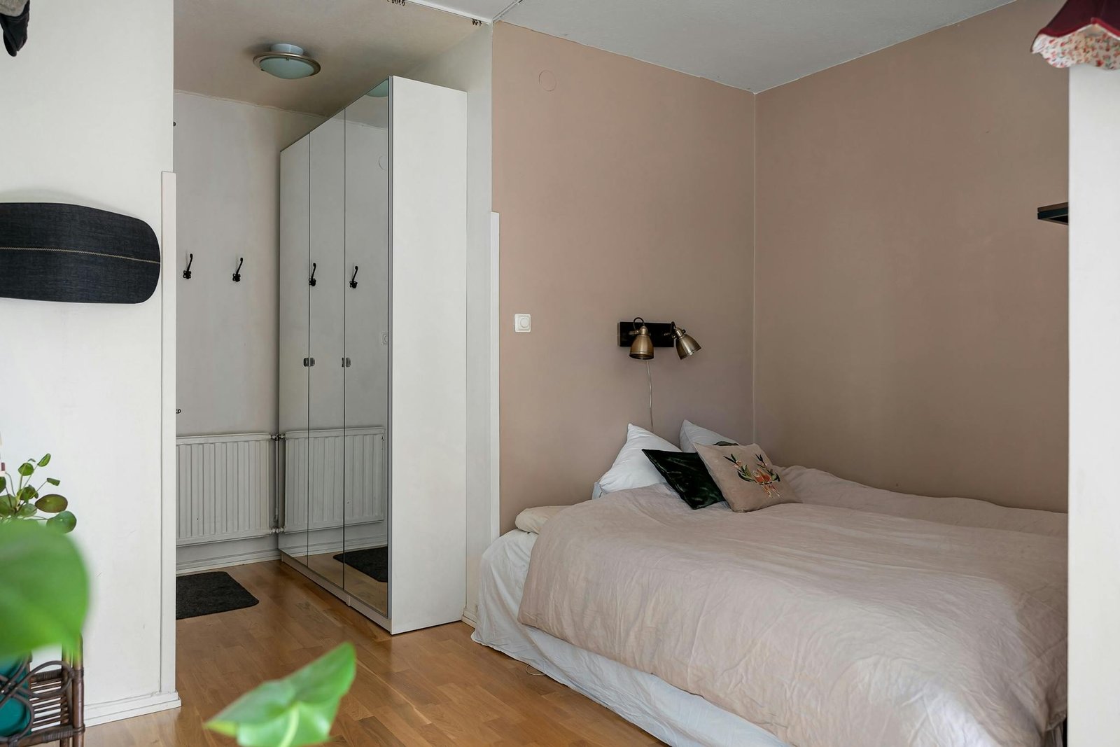 Elegant bedroom interior with neutral tones and minimalist design elements for a calming space.